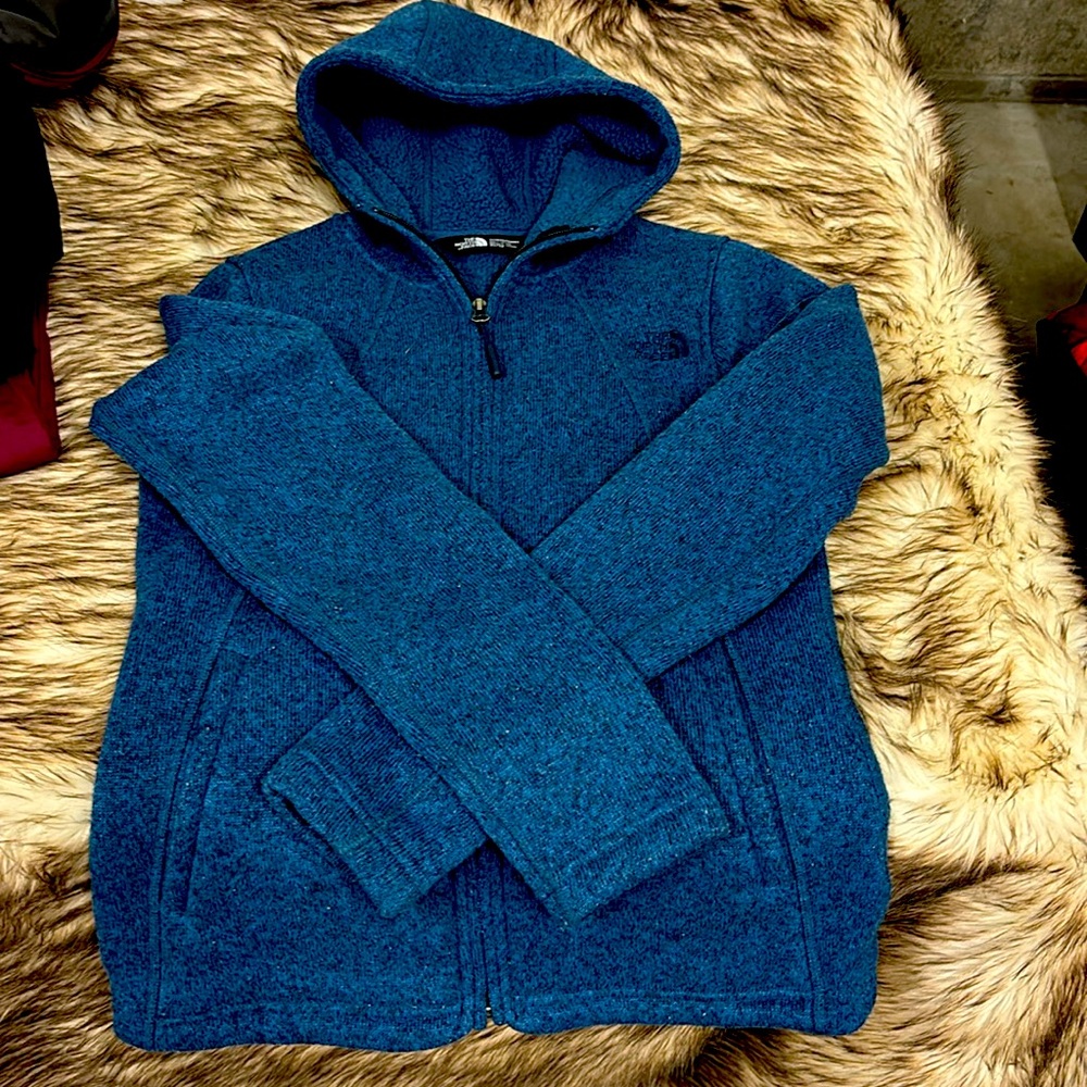 Women’s xs North Face hooded zip jacket.